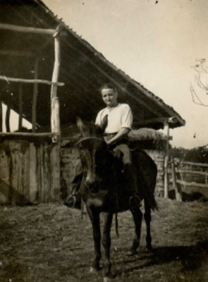 Br. Stracke on a mule